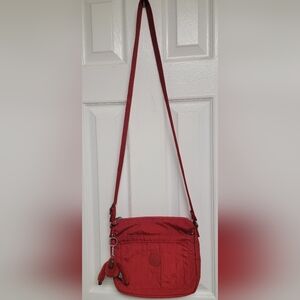 Kipling red crossbody purse